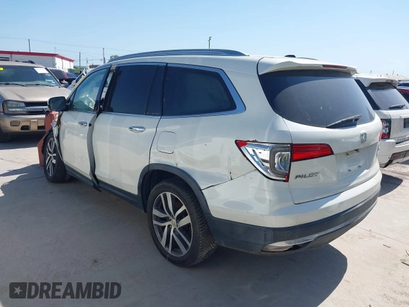 2016 Honda Pilot Touring with VIN 5FNYF6H97GB088824, listed as a IAAI auction lot 41991803 with 84,761 mi miles. Bid and sale history available at carsss.com. Image 3.