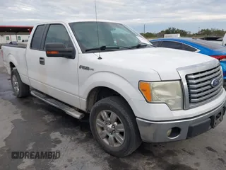 2011 Ford F-150 XL with VIN 1FTFX1CF7BFB42907, listed as a IAAI auction lot 41336158 with 319,430 mi miles. Bid and sale history available at carsss.com. Image 1.