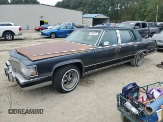 1990 Cadillac Brougham z VIN 1G6DW5472LR719564, wystawiony jako Copart lot #71634744 z przebiegiem Nie podano mil oraz Tytuł czysty. Historia ofert i sprzedaży dostępna na DreamBid. Obrazek 1.