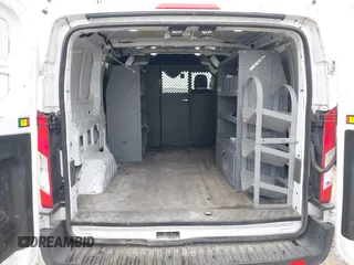 2020 Ford Transit Cargo with VIN 1FTYE1Y87LKA39598, listed as a IAAI auction lot 40989107 with 267,407 mi miles and . Bid and sale history available at DreamBid. Image 8.