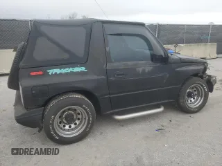 1994 Geo Tracker z VIN 2CNBE18U9R6936156, wystawiony jako Copart lot #45881915 z przebiegiem 201 227 mil mil oraz Szkody całkowita. Historia ofert i sprzedaży dostępna na DreamBid. Obrazek 3.