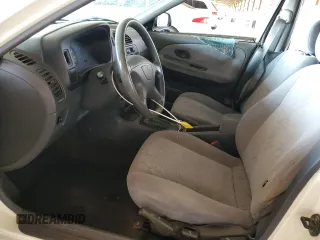 2001 Mitsubishi Mirage ES z VIN JA3AY26CX1U013535, wystawiony jako Copart lot #57664885 z przebiegiem 159 095 mil mil oraz Szkoda całkowita • Salvage title. Historia ofert i sprzedaży dostępna na DreamBid. Obrazek 7.