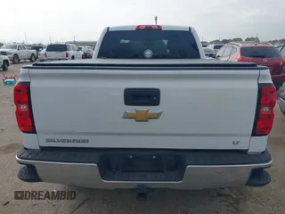 2018 Chevrolet Silverado 1500 LT with VIN 1GCRCREC4JZ224584, listed as a IAAI auction lot 41552287 with 137,026 mi miles and . Bid and sale history available at DreamBid. Image 16.
