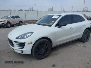 2015 Porsche Macan S with VIN WP1AB2A50FLB60518, listed as a IAAI auction lot 41797095 with 74,294 mi miles. Bid and sale history available at carsss.com. Image 2.