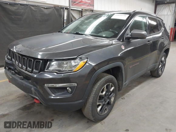2018 Jeep Compass Trailhawk with VIN 3C4NJDDB5JT451600, listed as a IAAI auction lot 41893541 with 155,528 mi miles and . Bid and sale history available at DreamBid. Image 17.