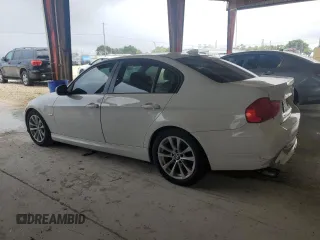 2011 BMW 3 Series 328i with VIN WBAPH7G50BNN06710, listed as a Copart auction lot 76987974 with 157,514 mi miles and Salvage Title. Bid and sale history available at carsss.com. Image 2.