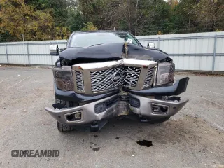 2017 Nissan Titan XD SL with VIN 1N6AA1F41HN548361, listed as a Copart auction lot 84654174 with 142,057 mi miles and Salvage Title. Bid and sale history available at carsss.com. Image 5.