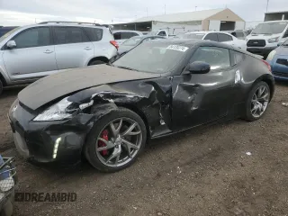 2014 Nissan 370Z Touring with VIN JN1AZ4EH2EM633814, listed as a Copart auction lot 84120274 with 22,979 mi miles and Salvage Title. Bid and sale history available at carsss.com. Image 1.