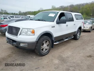 2005 Ford F-150 XLT with VIN 1FTPW14595FA87670, listed as a IAAI auction lot 42157009 with 291,713 mi miles. Bid and sale history available at carsss.com. Image 2.