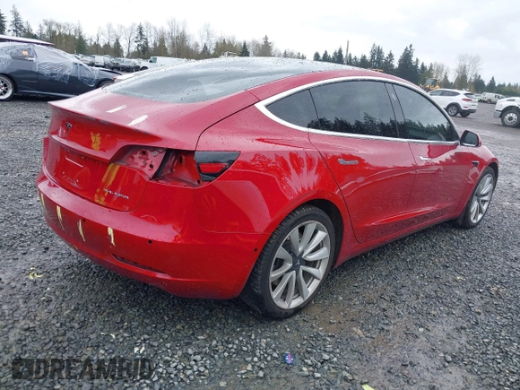 2018 Tesla Model 3 Long Range Battery z VIN 5YJ3E1EB2JF087823, wystawiony jako IAAI lot #41903609 z przebiegiem 69 749 mil mil oraz . Historia ofert i sprzedaży dostępna na DreamBid. Obrazek 4.