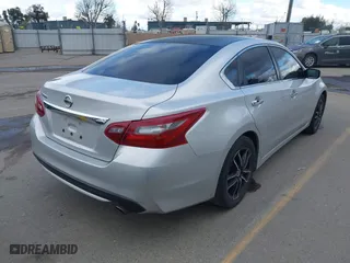 2018 Nissan Altima 2.5 SL with VIN 1N4AL3AP8JC216628, listed as a IAAI auction lot 41789254 with 135,965 mi miles. Bid and sale history available at carsss.com. Image 4.