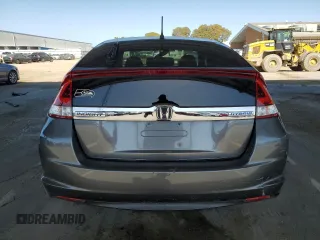 2013 Honda Insight with VIN JHMZE2H3XDS003838, listed as a Copart auction lot 52220235 with 144,729 mi miles and Salvage title. Bid and sale history available at DreamBid. Image 6.