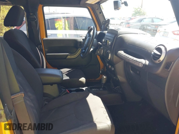 2014 Jeep Wrangler Sport with VIN 1C4AJWAG5EL223883, listed as a IAAI auction lot 42002814 with 134,361 mi miles and . Bid and sale history available at carsss.com. Image 5.