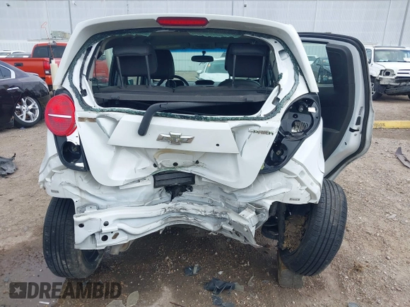 2014 Chevrolet Spark LT with VIN KL8CD6S94EC426322, listed as a IAAI auction lot 41894970 with 65,818 mi miles. Bid and sale history available at carsss.com. Image 6.