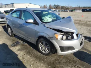 2014 Chevrolet Sonic LT with VIN 1G1JC5SHXE4164926, listed as a Copart auction lot 84021604 with 0 mi miles and Non Repairable. Bid and sale history available at carsss.com. Image 4.