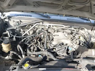 2004 Nissan Frontier XE z VIN 1N6ED27T84C446582, wystawiony jako IAAI lot #41428931 z przebiegiem Nie podano mil oraz . Historia ofert i sprzedaży dostępna na DreamBid. Obrazek 10.