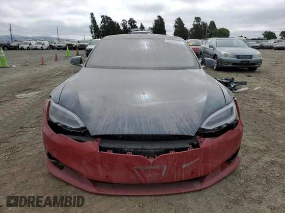2016 Tesla Model S 90D z VIN 5YJSA1E41GF171522, wystawiony jako Copart lot #59966545 z przebiegiem Nie podano mil oraz Szkoda całkowita • Salvage title. Historia ofert i sprzedaży dostępna na DreamBid. Obrazek 5.