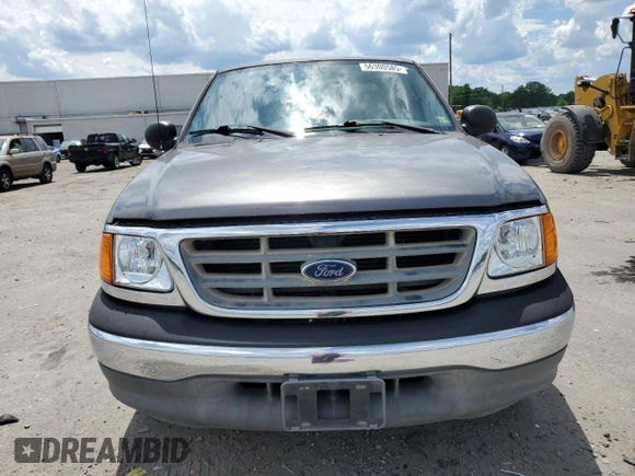 2004 Ford F-150 XL with VIN 2FTRX17274CA98376, listed as a Copart auction lot 56300585 with 71,767 mi miles and Salvage title. Bid and sale history available at DreamBid. Image 5.