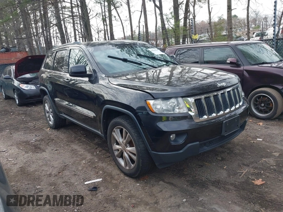 2012 Jeep Grand Cherokee Laredo with VIN 1C4RJEAG0CC316823, listed as a IAAI auction lot 41846479 with 215,317 mi miles. Bid and sale history available at carsss.com. Image 1.