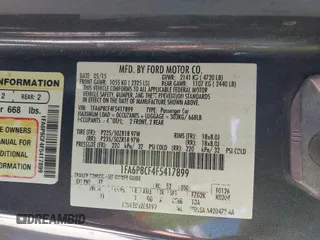 2015 Ford Mustang GT with VIN 1FA6P8CF4F5417899, listed as a IAAI auction lot 41816488 with 128,372 mi miles and . Bid and sale history available at carsss.com. Image 9.