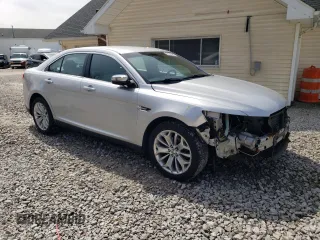 2014 Ford Taurus Limited with VIN 1FAHP2F83EG106227, listed as a Copart auction lot 63055365 with 194,026 mi miles and Salvage title. Bid and sale history available at DreamBid. Image 4.