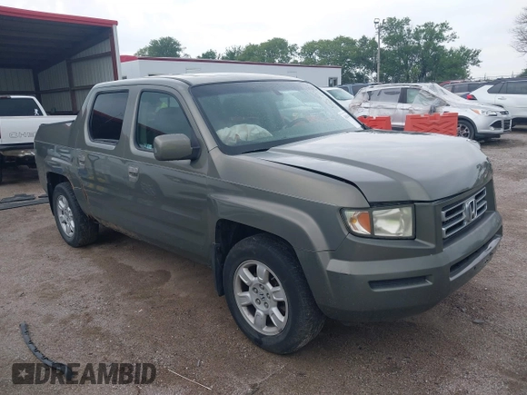 2007 Honda Ridgeline RTL with VIN 2HJYK16517H513832, listed as a IAAI auction lot 42626411 with 209,171 mi miles and . Bid and sale history available at DreamBid. Image 1.