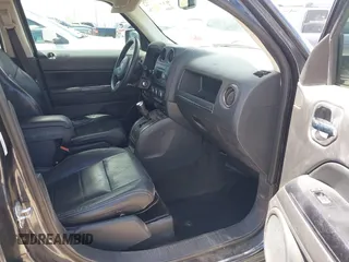 2014 Jeep Patriot Latitude with VIN 1C4NJPFA0ED848908, listed as a IAAI auction lot 41994006 with 131,122 mi miles and . Bid and sale history available at carsss.com. Image 5.