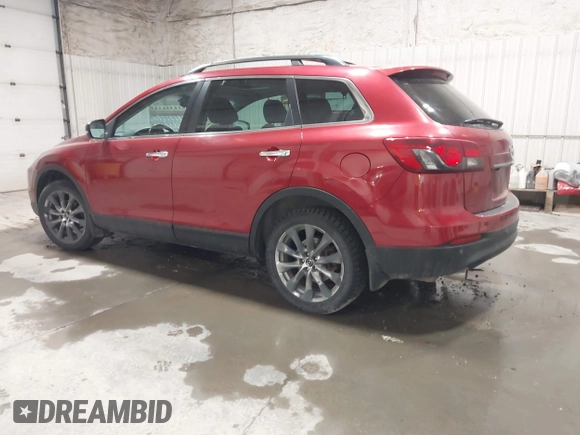 2015 Mazda CX-9 Grand Touring z VIN JM3TB3DAXF0464215, wystawiony jako IAAI lot #42043092 z przebiegiem 119 269 mil mil oraz . Historia ofert i sprzedaży dostępna na DreamBid. Obrazek 3.
