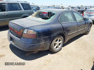2003 Pontiac Bonneville SE z VIN 1G2HX52K834148229, wystawiony jako IAAI lot #42300423 z przebiegiem 120 546 mil mil oraz . Historia ofert i sprzedaży dostępna na DreamBid. Obrazek 4.