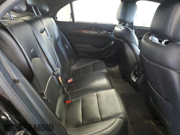 2015 Cadillac CTS Premium AWD z VIN 1G6AZ5S3XF0127669, wystawiony jako Copart lot #56314865 z przebiegiem 211 973 mil mil oraz Czysty tytuł • Clean title. Historia ofert i sprzedaży dostępna na DreamBid. Obrazek 10.