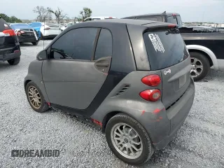 2012 Smart fortwo Pure z VIN WMEEJ3BA2CK519118, wystawiony jako Copart lot #57813115 z przebiegiem 127 472 mil mil oraz Tytuł czysty. Historia ofert i sprzedaży dostępna na DreamBid. Obrazek 2.