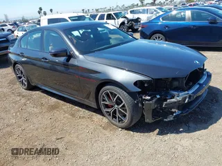2023 BMW 5 Series 530i with VIN WBA53BH08PCL21884, listed as a IAAI auction lot 41991227 with 30,171 mi miles and . Bid and sale history available at DreamBid. Image 1.