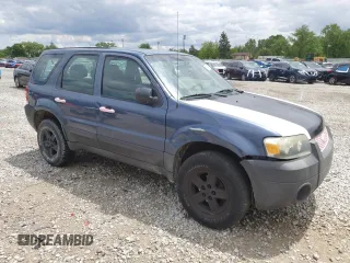 2005 Ford Escape XLS Value with VIN 1FMYU92Z95DA22100, listed as a Copart auction lot 57874705 with 192,057 mi miles and Salvage title. Bid and sale history available at DreamBid. Image 4.
