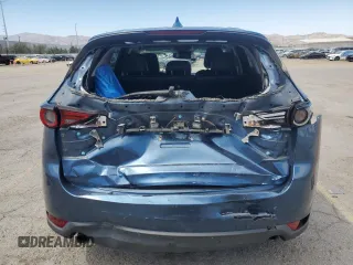 2018 Mazda CX-5 Grand Touring with VIN JM3KFBDM3J0323211, listed as a Copart auction lot 61166735 with Not provided miles and Salvage title. Bid and sale history available at DreamBid. Image 6.