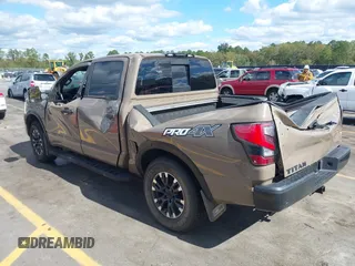 2021 Nissan Titan Pro-4X with VIN 1N6AA1ED4MN531369, listed as a IAAI auction lot 40597122 with 32,161 mi miles and . Bid and sale history available at DreamBid. Image 3.