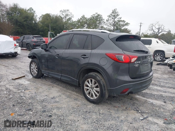 2015 Mazda CX-5 Touring with VIN JM3KE2CY4F0435563, listed as a IAAI auction lot 41311988 with 187,183 mi miles. Bid and sale history available at carsss.com. Image 3.