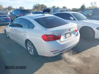 2016 BMW 4 Series 428i xDrive with VIN WBA4C9C54GG139275, listed as a IAAI auction lot 40828786 with 128,124 mi miles and . Bid and sale history available at carsss.com. Image 3.