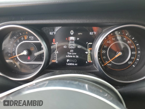 2018 Jeep Wrangler Unlimited Sahara with VIN 1C4HJXEG0JW141101, listed as a Copart auction lot 56573195 with 143,854 mi miles and Salvage title. Bid and sale history available at DreamBid. Image 9.