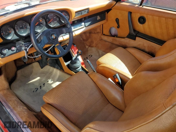1977 Porsche 911 with VIN 9117200797, listed as a Copart auction lot 49103365 with 145,827 mi miles and Salvage title. Bid and sale history available at DreamBid. Image 8.