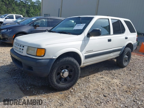 1998 Isuzu Rodeo with VIN 4S2CK58D3W4301606, listed as a IAAI auction lot 42453329 with 219,433 mi miles and . Bid and sale history available at DreamBid. Image 2.