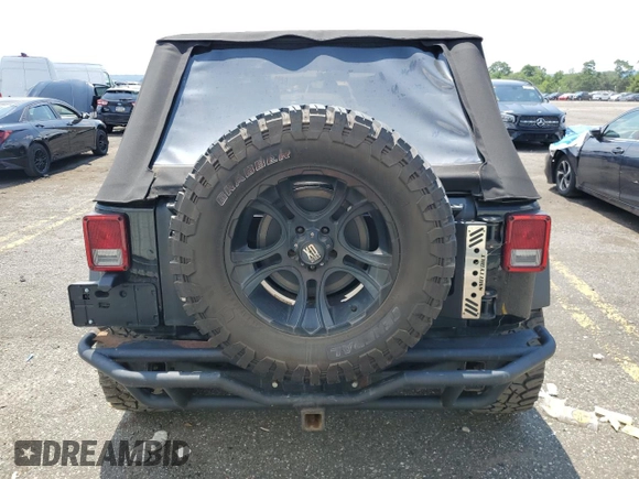 2015 Jeep Wrangler Unlimited Sport with VIN 1C4BJWDG1FL668395, listed as a Copart auction lot 64035035 with 79,972 mi miles and Salvage title. Bid and sale history available at DreamBid. Image 6.