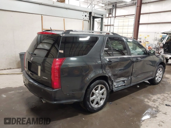 2005 Cadillac SRX with VIN 1GYEE63A550155188, listed as a IAAI auction lot 41442286 with 168,882 mi miles. Bid and sale history available at carsss.com. Image 4.