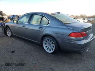2006 BMW 7 Series 750i with VIN WBAHL83596DT03728, listed as a Copart auction lot 87855795 with 127,513 mi miles and Salvage title. Bid and sale history available at DreamBid. Image 2.