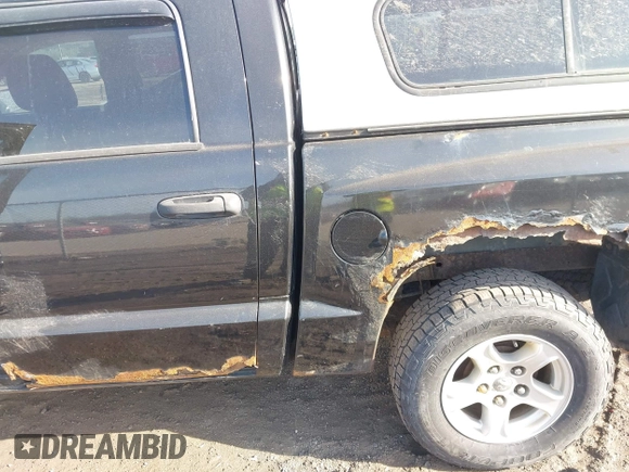 2007 Dodge Dakota ST with VIN 1D7HW28K57S271109, listed as a IAAI auction lot 41773429 with 149,350 mi miles and . Bid and sale history available at carsss.com. Image 6.