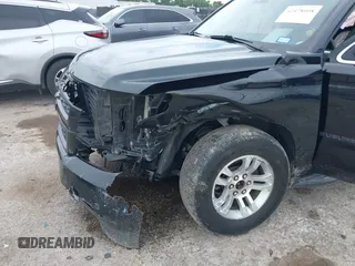 2020 Chevrolet Suburban LT with VIN 1GNSKHKC9LR103062, listed as a IAAI auction lot 42478008 with 229,786 mi miles and . Bid and sale history available at DreamBid. Image 6.