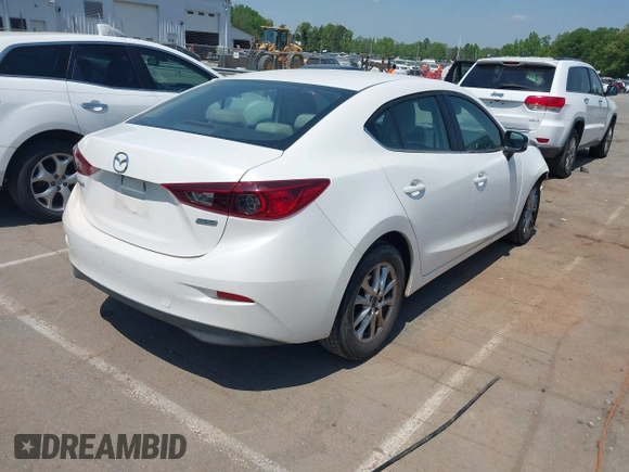 2016 Mazda Mazda3 i Sport with VIN 3MZBM1U73GM320945, listed as a IAAI auction lot 42081672 with 171,000 mi miles. Bid and sale history available at carsss.com. Image 4.