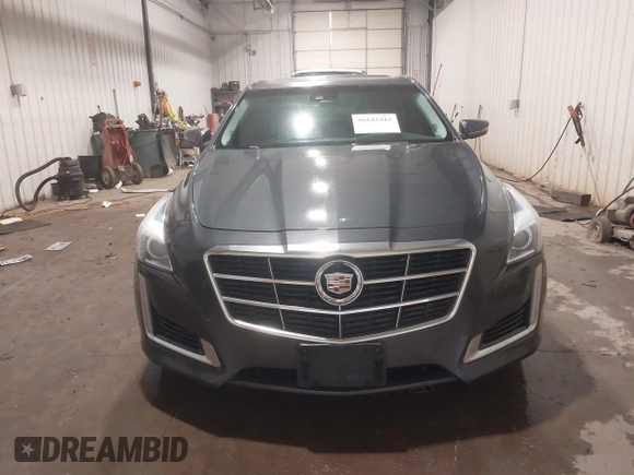 2014 Cadillac CTS Luxury AWD with VIN 1G6AX5S37E0172041, listed as a IAAI auction lot 40343343 with 102,506 mi miles and . Bid and sale history available at DreamBid. Image 12.