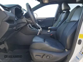 2021 Toyota RAV4 Hybrid XSE with VIN 2T3E6RFV1MW018990, listed as a Copart auction lot 64043865 with 55,938 mi miles and Salvage title. Bid and sale history available at DreamBid. Image 7.