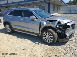 2023 Cadillac XT4 FWD Premium Luxury with VIN 1GYFZCR42PF170188, listed as a Copart auction lot 48849355 with 48,810 mi miles and Salvage Title. Bid and sale history available at carsss.com. Image 4.