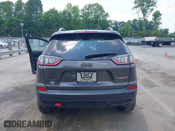 2020 Jeep Cherokee Trailhawk with VIN 1C4PJMBX5LD530720, listed as a IAAI auction lot 42404948 with 99,606 mi miles and . Bid and sale history available at DreamBid. Image 16.